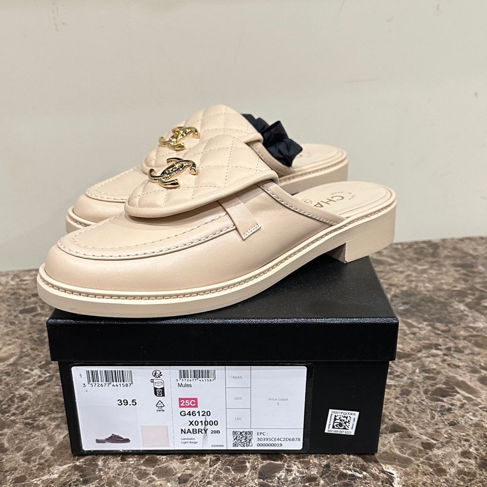 CHANEL Beige Quilted Loafers with Gold Accent